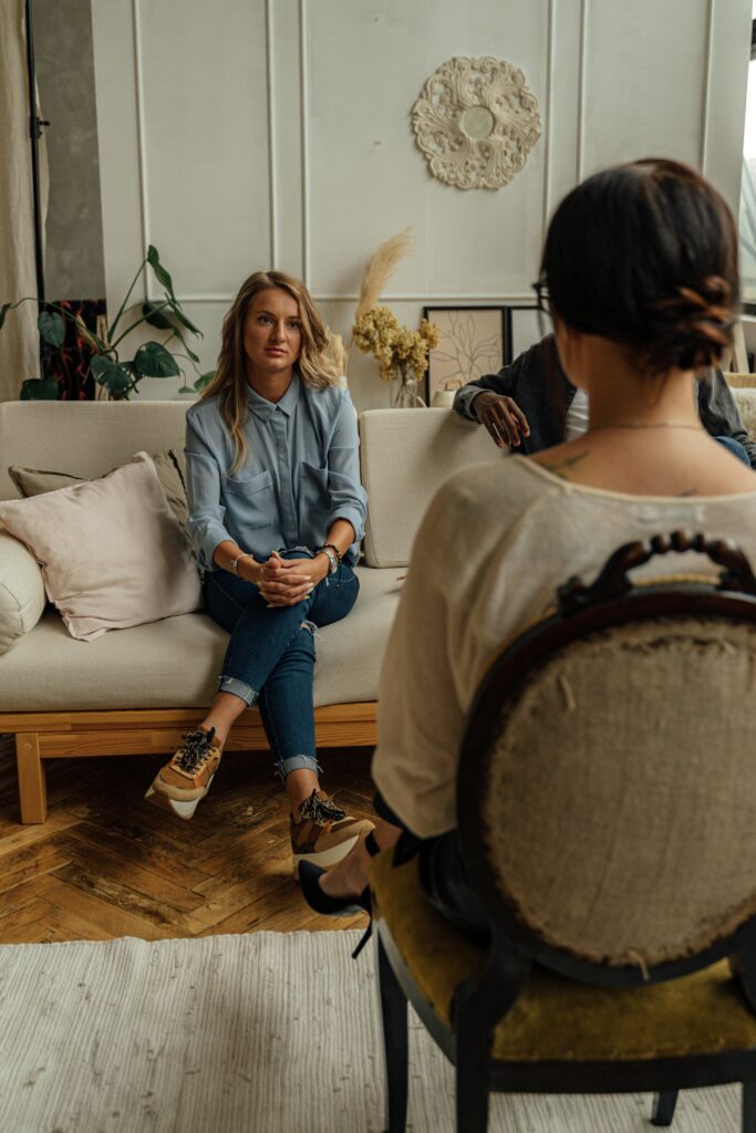 pexels-photo-5217831-5217831 A therapist and client in discussion during a cozy indoor session highlighting mental health.